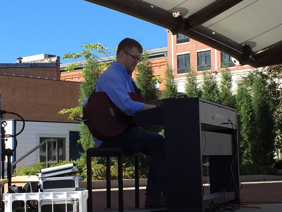 Jim Carlson plays piano at the Wausau Festival of Arts, 400 Block, Wausau, WI. 